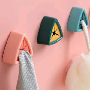 Pack of four self-adhesive towel and rag storage plugs.